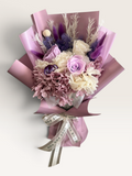 Lavender Poetry preserved bouquet with lavender roses, dusty pink and ivory hydrangeas and purple accents