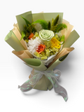 Verdant Glow medium preserved flower bouquet in green, yellow and orange